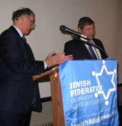 Rabbi Dr Mitchell Serels Rabbi Dr. Mitchell Serels, right, spoke about the fate of Sephardi communities during the Holocaust. Dr. Peter Schild, left, is a member of the commemoration planning committee.