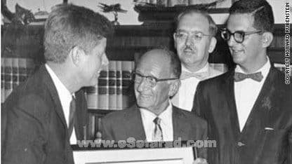 Morris Morgenstern, center, showed a number of notable people his prized letter, including then-Sen. John F. Kennedy. Howard Rubenstein is at right.