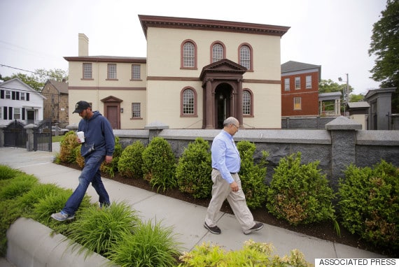 Employees Chuck Flippo, right, and Asa Montgomery walk through Patriots Park at the Touro Synagogue, the nation's oldest, in Newport, R.I.)
