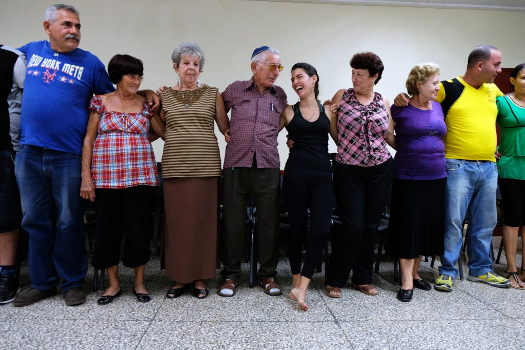 Members of the Jewish community dance the hora at the Beth Shalom synagogue, Sept. 1, 2015, Havana. (Jonathan Alpeyrie)